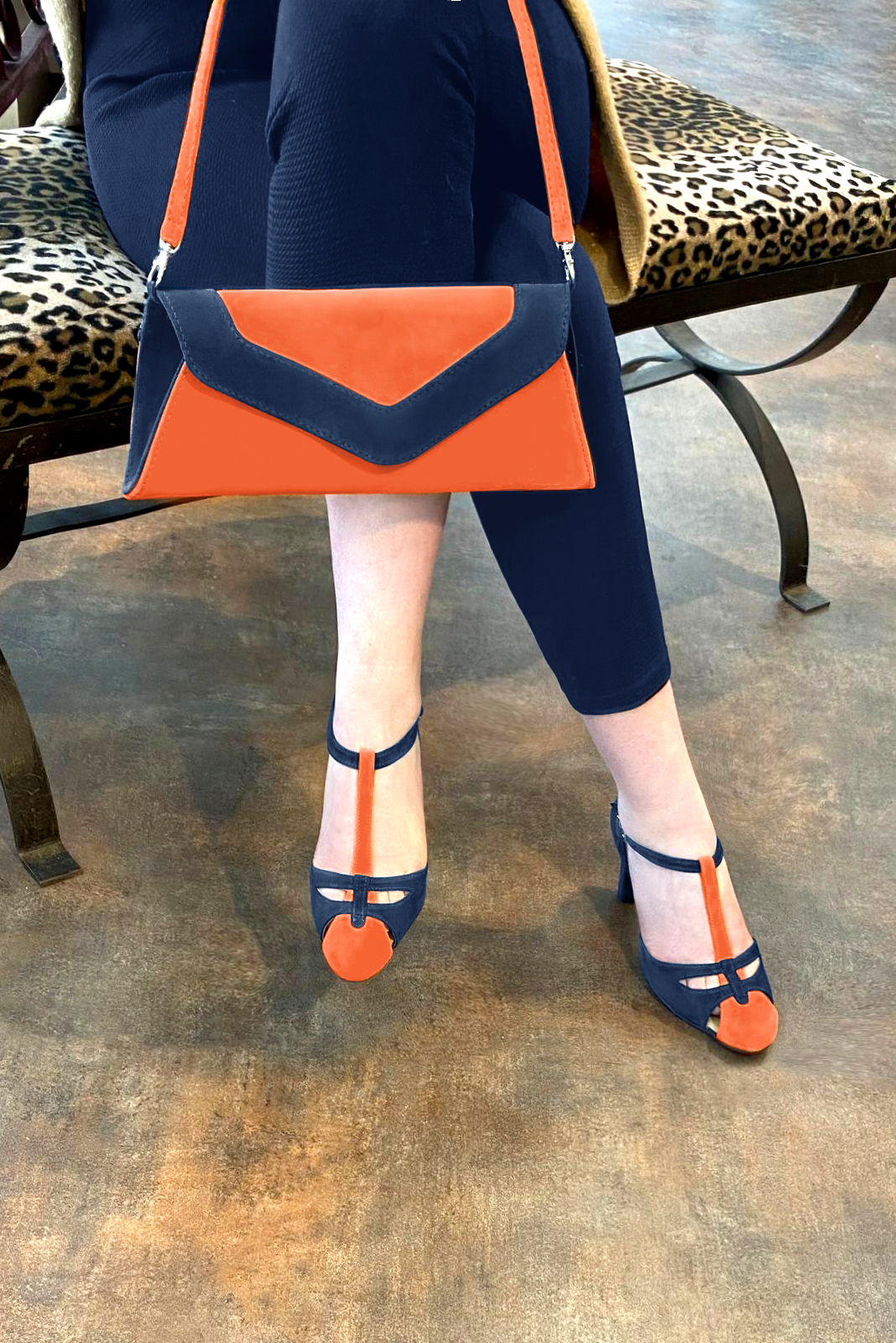 Clementine orange and navy blue women's T-strap open side shoes. Round toe. High kitten heels. Worn view - Florence KOOIJMAN